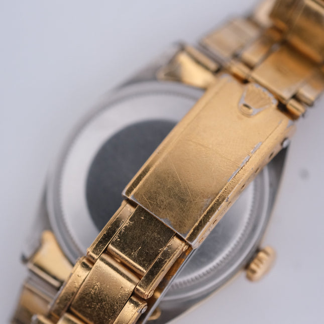 1974 Rolex Oyster Perpetual Date Ref. 1550 - Gold Watch with Black Face