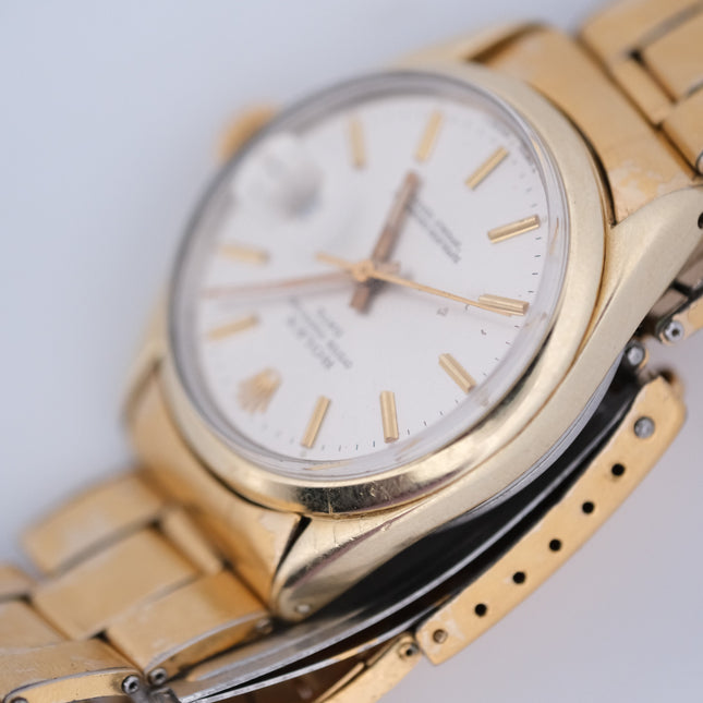 1974 Rolex Oyster Perpetual Date Ref. 1550 14k Gold Shell wrist watch with white dial