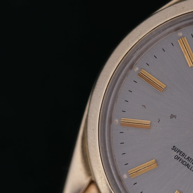 1974 Rolex Date Ref 1550 with gold face and white dial