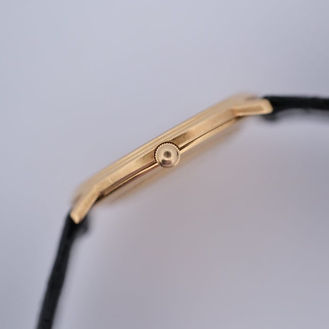 Audemars Piguet Classic 18k gold watch with black leather strap