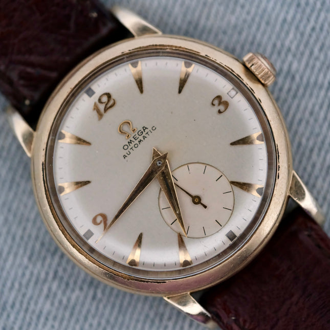 Omega Automatic Bumper Cal. 354 gold wrist watch with white dial
