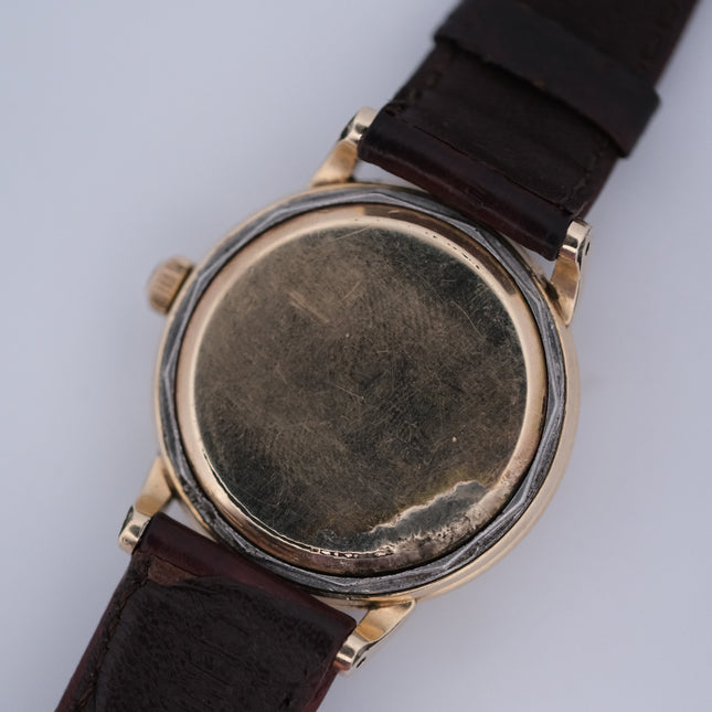 Omega Automatic Bumper Cal. 354 watch with gold case and brown leather strap