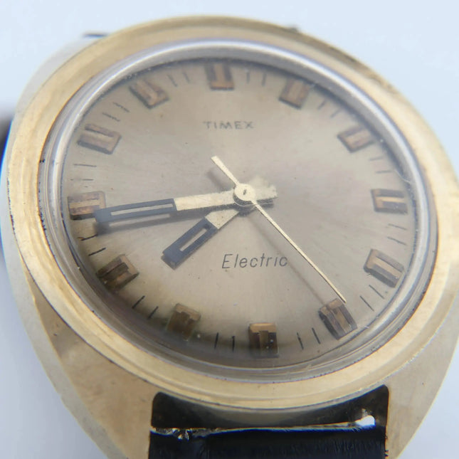 Vintage Timex Electric Cushion Case with Champagne Dial and Black Leather Strap
