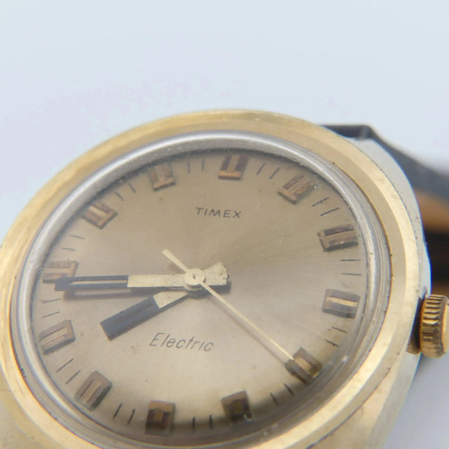 Vintage Timex Electric Swiss watch with champagne dial and gold case