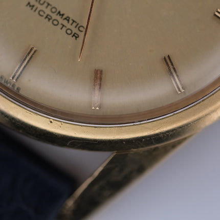 Vintage Universal Genève Polerouter Jet 18k Cal. 215-9 watch with gold case and blue strap