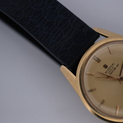 Vintage Universal Genève Polerouter Jet 18k Cal. 215-9 watch with gold case and black leather strap