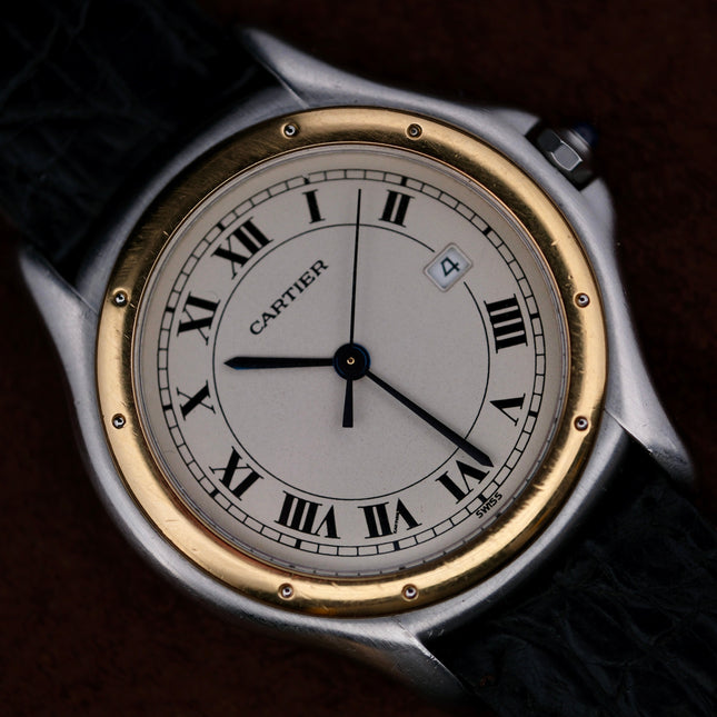 Close-up of Cartier Cougar Gents Date Ref. 187904 watch with Roman numerals and elegant design
